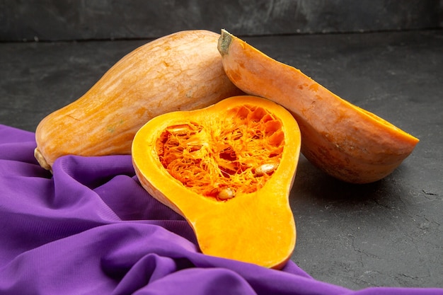 Free Photo front view fresh pumpkin sliced fruit on the dark table color food fruit ripe