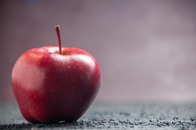 Free photo front view fresh red apple mellow ripe fruit on a dark-blue desk plant many fruit tree color red fresh