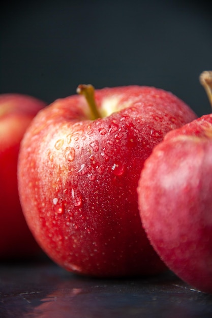 Front view fresh red apples on dark background color mellow ripe vitamine apple pear tree food diet