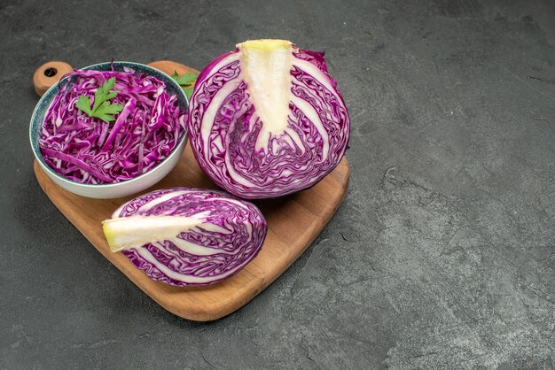 Front view fresh red cabbage sliced vegetable on the dark table ripe health salad diet