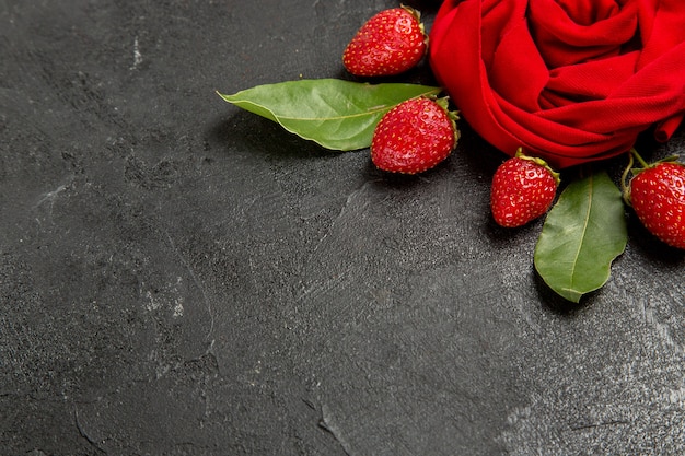 Front view fresh red strawberries on dark background