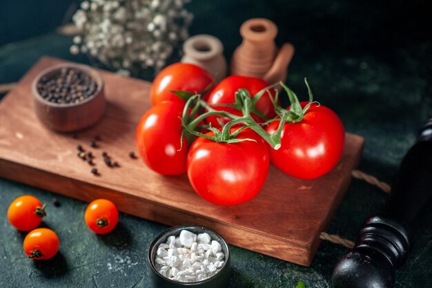 front view fresh red tomatoes on dark background