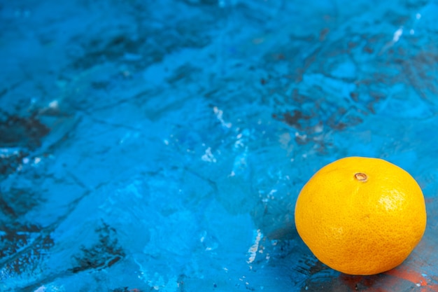 Front view fresh tangerine on the blue table