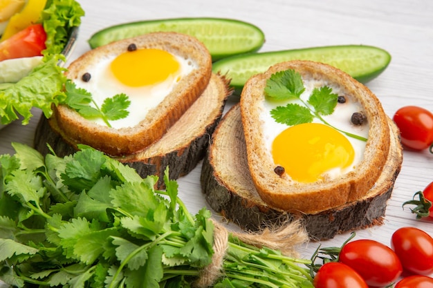 Free photo front view fresh vegetable salad with egg toasts on white background lunch ripe food breakfast salad diet healthy life meal