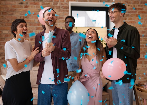 Free Photo front view friends celebrating gender reveal