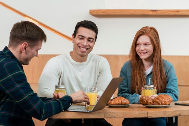 Free Photo front view of friends spending time together