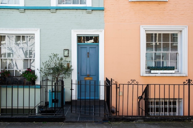 Front view of front door with blue and orange wall