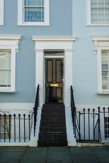 Front view of front door with blue wall