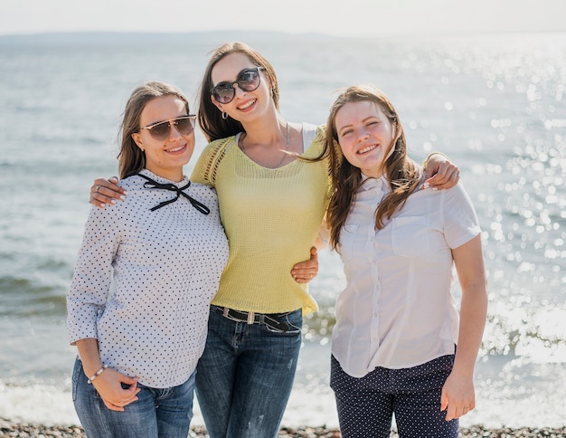 Front view girl friends at the seaside