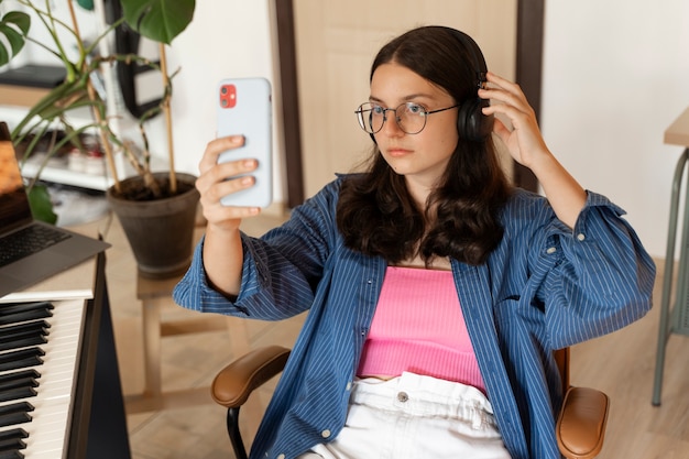 Front view girl taking selfie