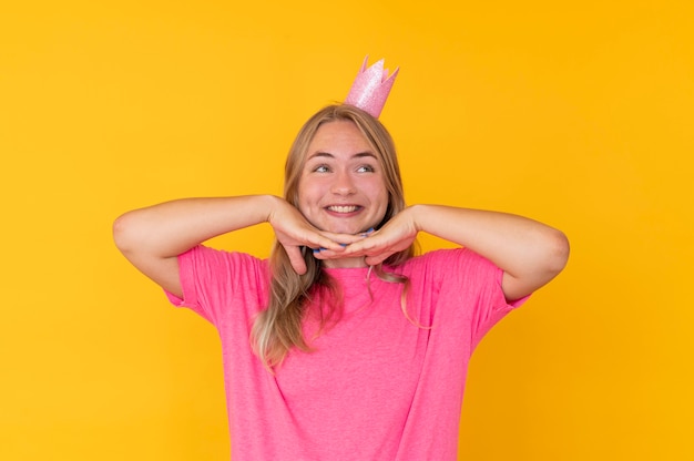 Free Photo front view of girl wearing a crown concept