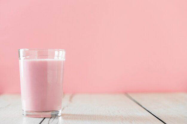 Front view of glass with pink milkshake