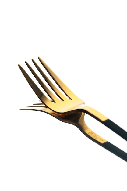 front view golden fork on white background