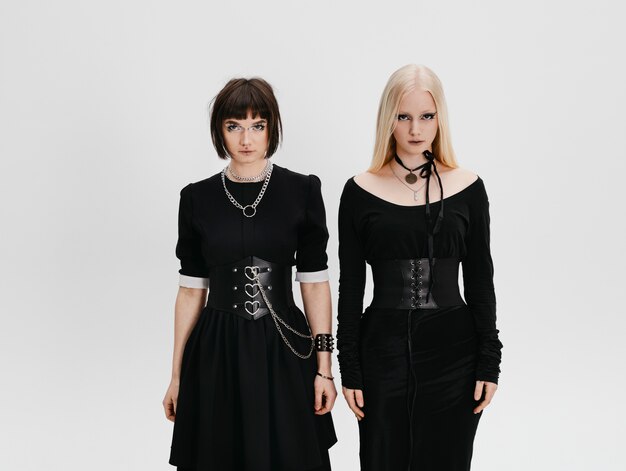 Front view goth girls posing in studio