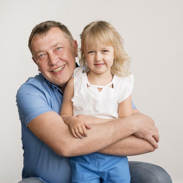 Front view of granddaughter and grandfather