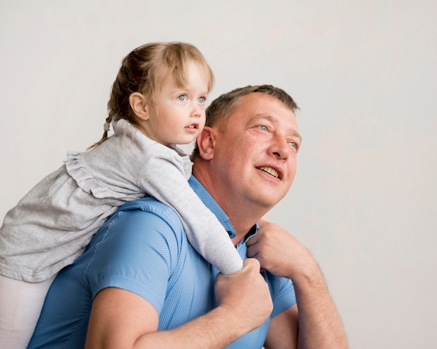 Front view of granddaughter and grandfather