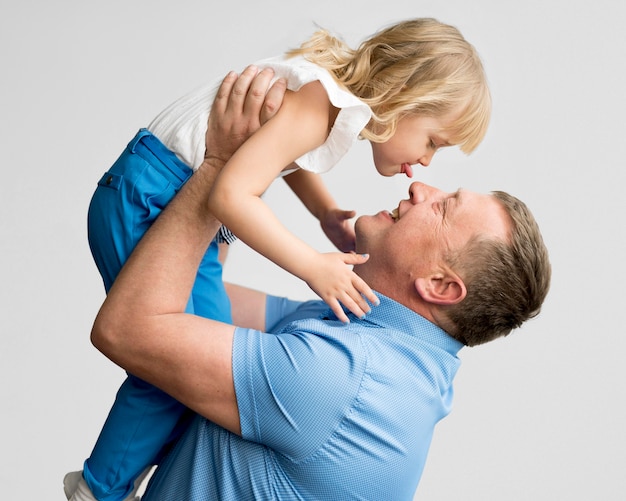 Front view of granddaughter and grandfather