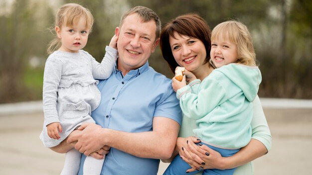 Front view of grandparents and granddaughters