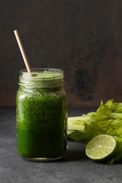 Front view green healthy smoothie in jar