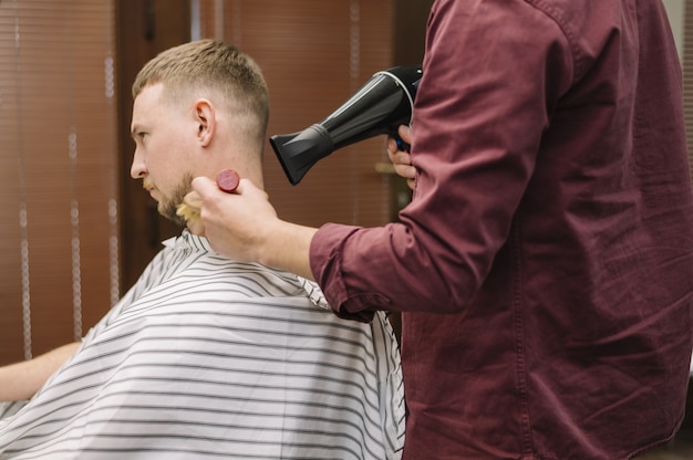 Front view of hairstyling using the hairdryer