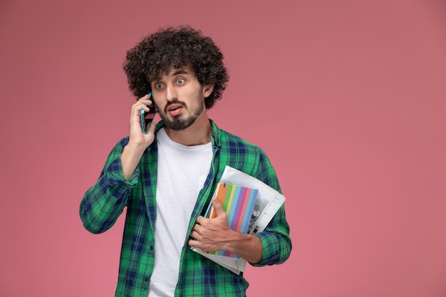 Free photo front view handsome man surprised to new information