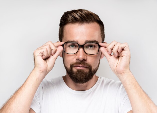 Front view handsome man wearing glasses