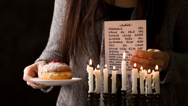 Free photo front view of hanukkah candle holder concept