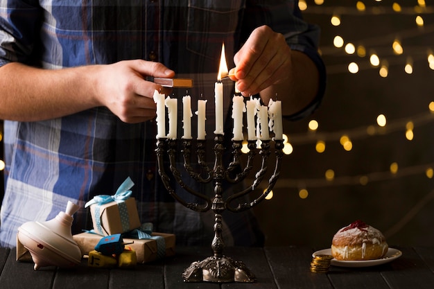 Free Photo front view of hanukkah candle holder concept