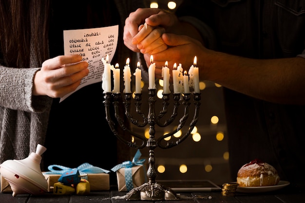 Free photo front view of hanukkah candle holder concept