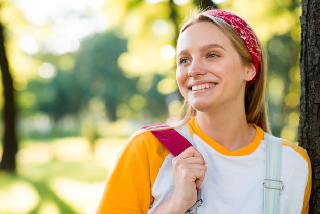 Front view of happy woman outdoors