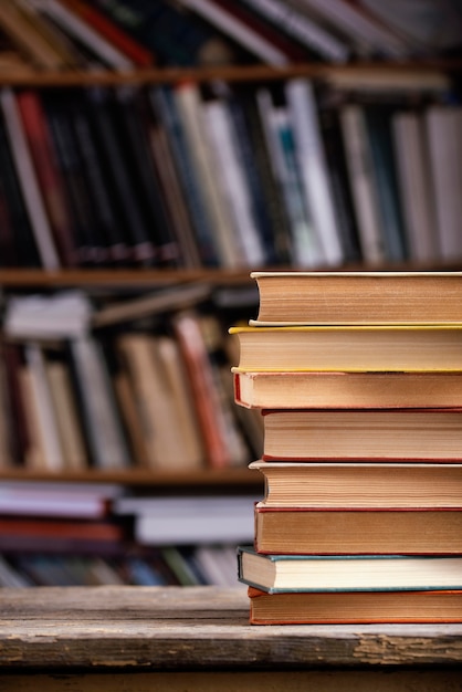 Front view of hardback books with copy space