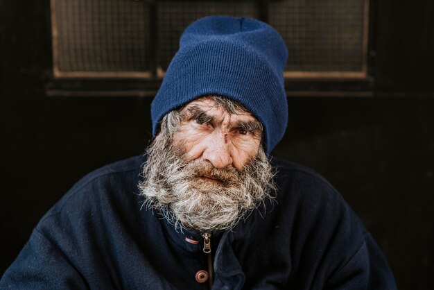 Front view of homeless man with beard