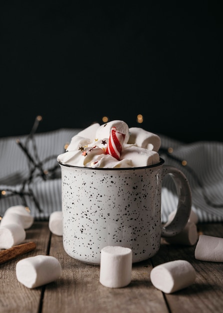 Free Photo front view hot chocolate in mug with marshmallows