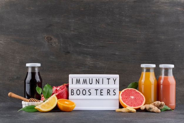 Free photo front view of immunity boosting foods with citrus and ginger