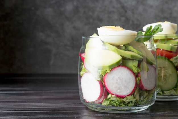 Front view jar filled with organic vegetables