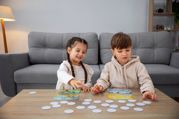 Front view kids playing memory game