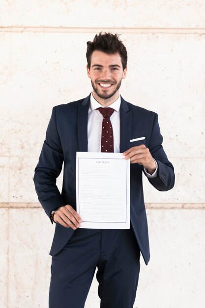 Front view lawyer holding a contract