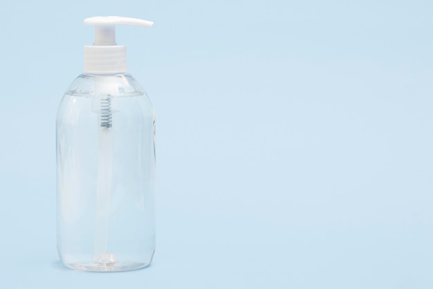 Front view of liquid soap in plastic bottle with copy space