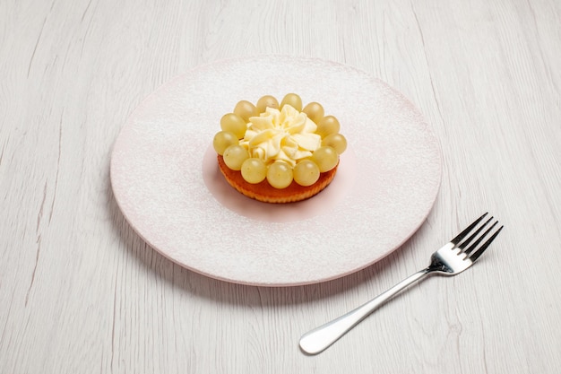 Front view little cream cake with fresh grapes on white background pie fruit cake dessert biscuit cookie