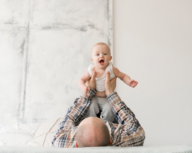 Free Photo front view of lovely father and child