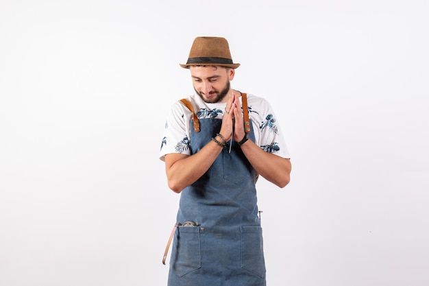 Front view male bartender just standing on white wall alcohol job club drink bar night