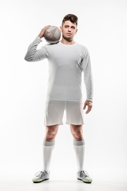 Free Photo front view of male rugby player posing with ball