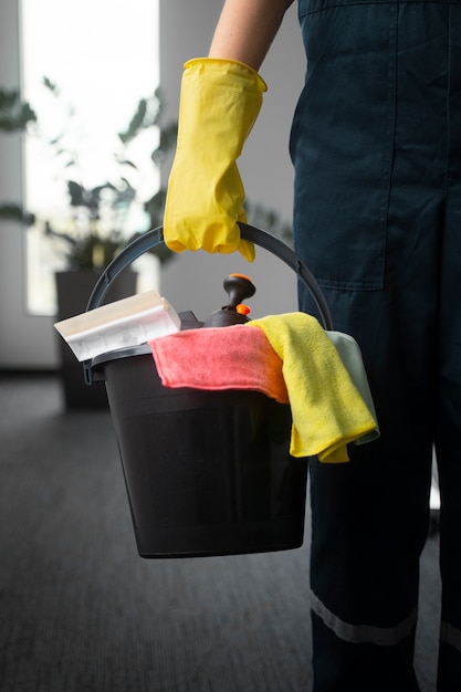 Free Photo front view man cleaning indoors