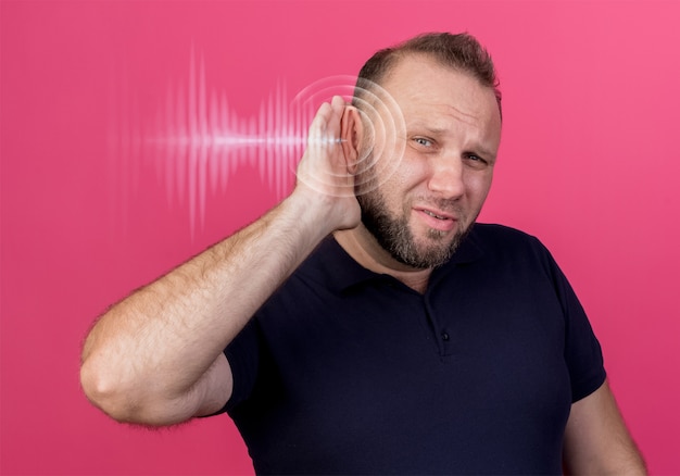 Free photo front view man experiencing hearing issues