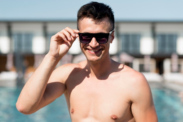 Front view of man at pool