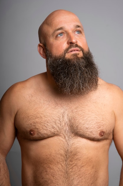 Front view man posing in studio