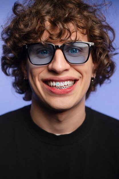 Front view man posing with dental gems