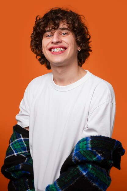 Front view man posing with dental gems