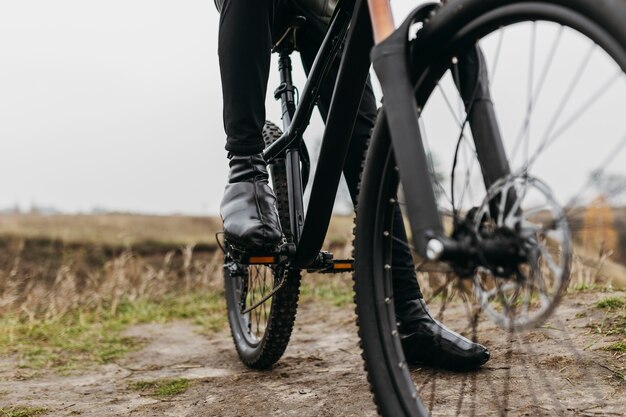 Front view of man riding a bike