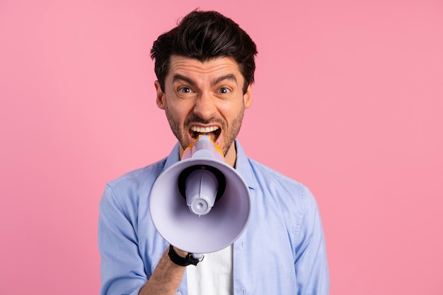 Front view of man shouting into a megaphone